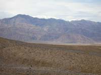 23-snowy_peaks_and_rainstorms_from_Harmony_Borax_Works