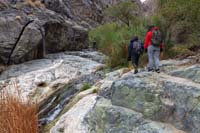 08-trail_continues_on_the_rocks_along_the_stream