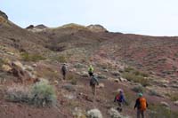 02-group_hiking_through_the_desert,some_didn't_want_another_peak