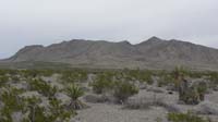 27-mountains_views_from_turn-around_point-looking_E-notice_the_amazing_strata_uplifted_and_folded_on_itself