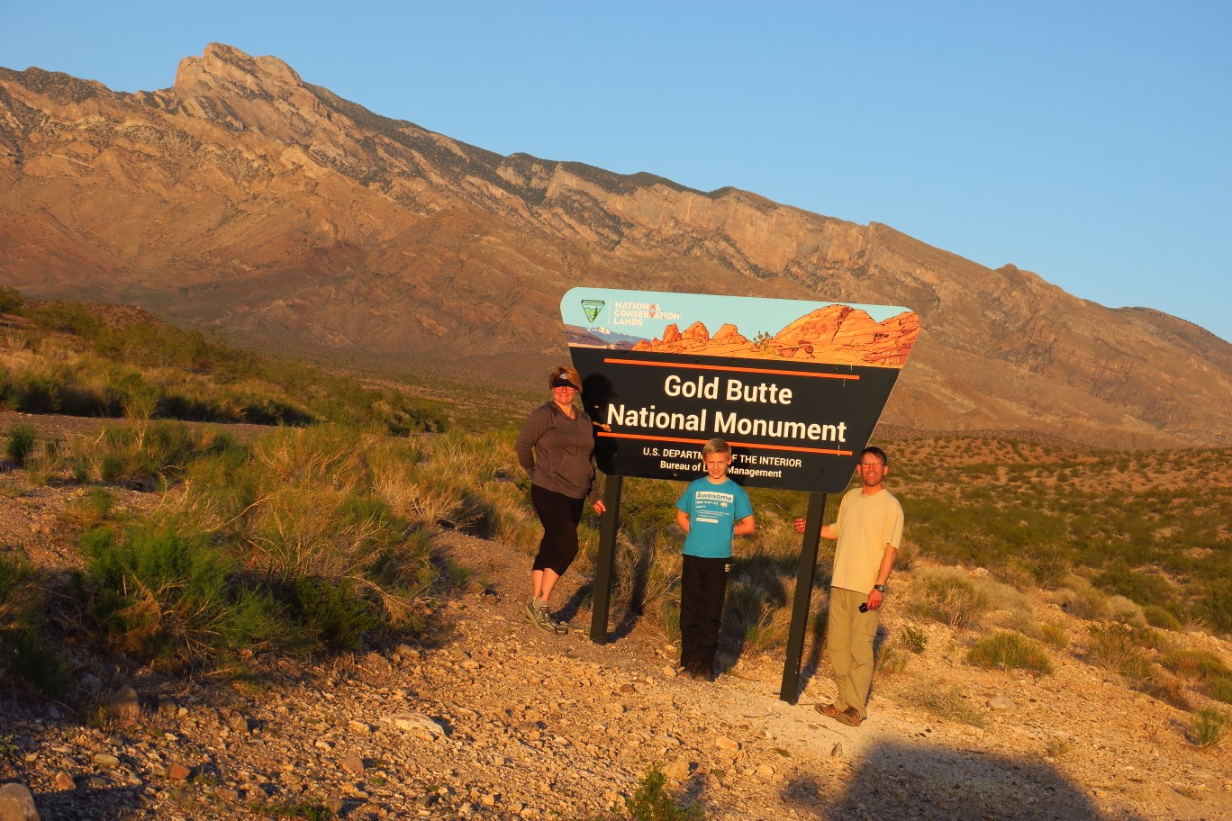 76-family_at_Gold_Butte_NM_sign