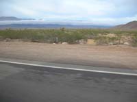 158-pretty_thin_layered_cloud_in_front_of_Music_Mountains-dirt_road_on_other_side