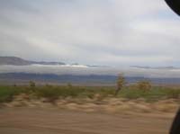 159-pretty_thin_layered_cloud_in_front_of_Music_Mountains-dirt_road_on_other_side