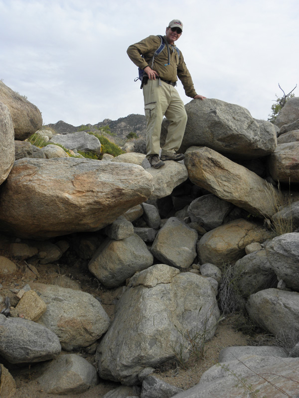 69-Tom_on_precariously_lodged_balanced_rock