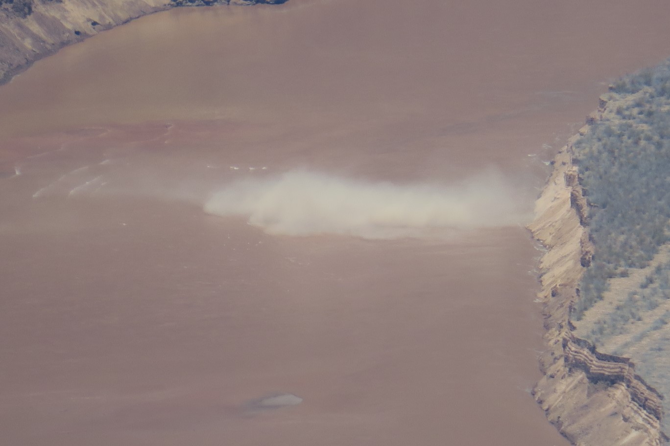 16-cliff_landslide-debris_spreading_across_river