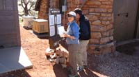 06-Luba_and_Ed_checking_out_the_park_info-from_Jenn