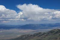 18-scenic_view_from_summit-looking_W-zoom_view_of_wind_farm_and_storm
