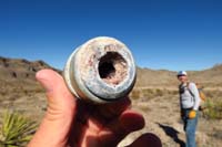 21-bottom_of_round,particles_fell_out_and_smelled_gun_powder