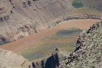 07-zoom_view_of_swift_flowing_river_with_river_rafters