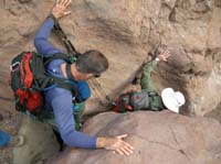 24-Greg_and_Bob_climbing_down_a_large_boulder