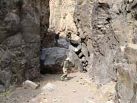 49-Randy's_picture-Greg_and_Chris_climbing_down_boulder