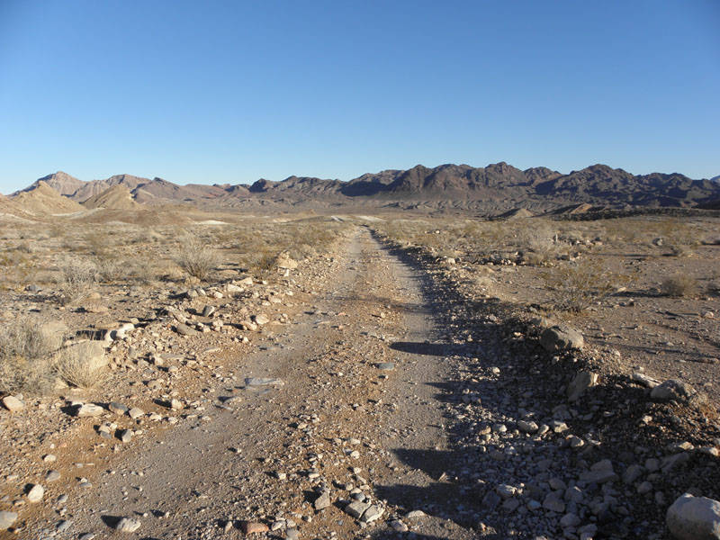 56-scenic_sunset_mountain_views_along_dirt_road