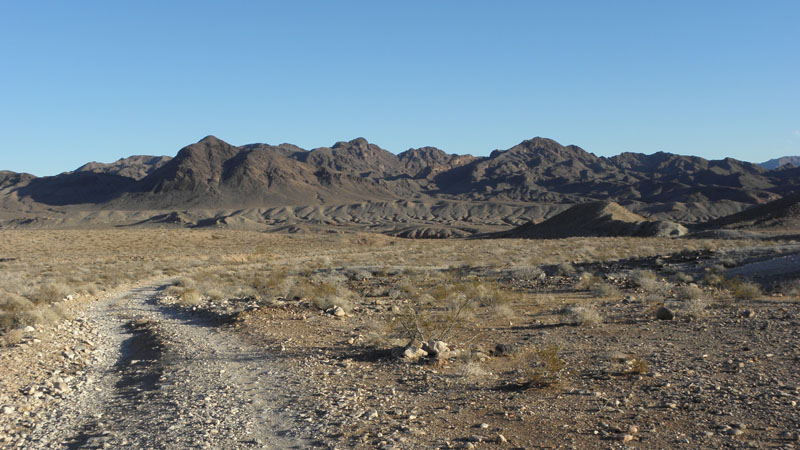 60-scenic_sunset_mountain_views_along_dirt_road