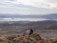 65-Ryan_and_Peppe_on_Anniversary_Narrows_Peak_looking_WSW-tourist_helicopter_flying_by