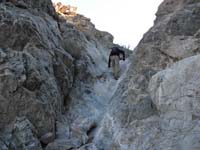 04-Peppe_climbing_up_dry_waterfall_at_beginning_of_hike