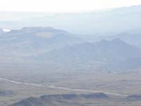 26-zoomed_view_to_SW_of_Malpais_Flattop_Mesa_and_Willow_Beach_Peak-Kenny_Peak