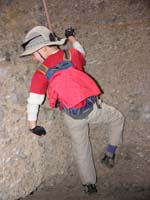 36-Kenny_hooked_up_with_webbing_around_waste-starting_to_climb-first_time_being_on_rope