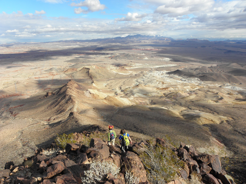 31-Kenny_and_Sierra_scrambling_down-pretty_scenery_in_background