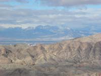 20-scenic_view_from_peak-looking_W-zoom_of_snow_covered_mountains