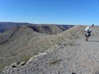32-1028-caught_up_to_Greg-great_wildlife_usage_trails_along_ridgeline_we_follow_to_plateau_for_Sandwich_Peak