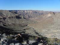 36-neat_scenery-peak_to_left-route_back_is_down_there_to_saddle_to_right_of_Fortress_Peak_to_right