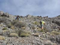 24-Joel_and_Minas_heading_up_scree-Toby_in_distance_waiting