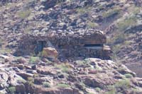 55-scenic_view_from_a_point-zoom_of_WWII_bunker-never_seen_this_perspective_showing_door,windows