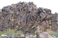 44-igneous_garnet_shist_wall_that_is_bending_due_to_past_heat_and_pressure