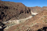 08-going_around_obstacle_to_reach_the_drainage-Lake_Mead_in_view