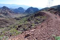 04-now_we_have_to_reach_that_peak_in_the_center,first_we_go_down_slope_to_left