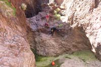 37-looking_back_to_Ed,Luba,_and_Candace_scrambling_down_wall