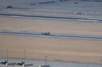 24-scenic_view_from_Sunrise_Mountain-looking_W-Nellis_AFB-F-15_figher_jet_on_runway
