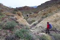 06-Ed_and_Luba_meandering_through_wash