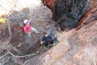 06-1st_rappel_reached_quickly_in_less_than_5_minutes-looking_down_cliff_and_motorcycle