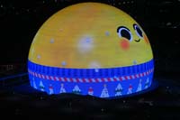 41-Sphere_Emoji_in_a_winter_sweater_waking_up_to_eat_snowflakes