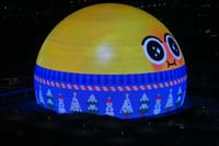 45-Sphere_Emoji_in_a_winter_sweater_waking_up_to_eat_snowflakes