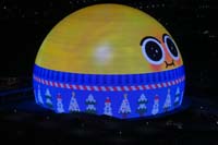 46-Sphere_Emoji_in_a_winter_sweater_waking_up_to_eat_snowflakes