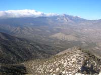 46-Spring_Mountains_and_storm_front-our_route_towards_hump_to_right_below