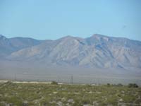 01-our_destination_as_seen_from_Hwy_95-follow_ridge_from_left-don't_know_name_of_peak_as_yet