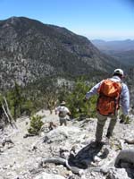 23-Laszlo_and_Ed_heading_down_steep_slope