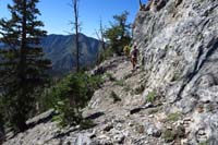 05-across_along_base_of_cliff-peak_is_quite_close,but_above_us