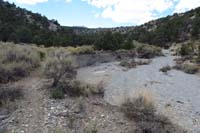 28-flood_almost_wiped_out_the_trail,but_skirts_the_edge_of_cliff