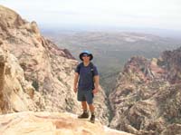 41-Chris_standing_on_the_edge_of_a_steep_drop