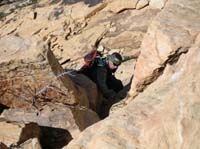 35-Greg_climbing_up_rocks