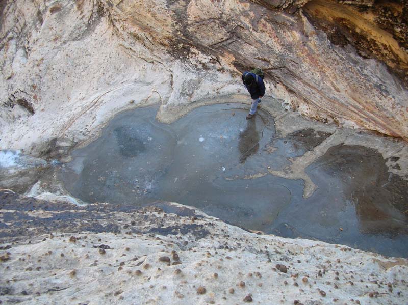 18-frozen_water_above_waterfall-Colin_testing_ice