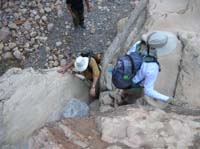 030-Joan_and_Bob_climbing_a_boulder