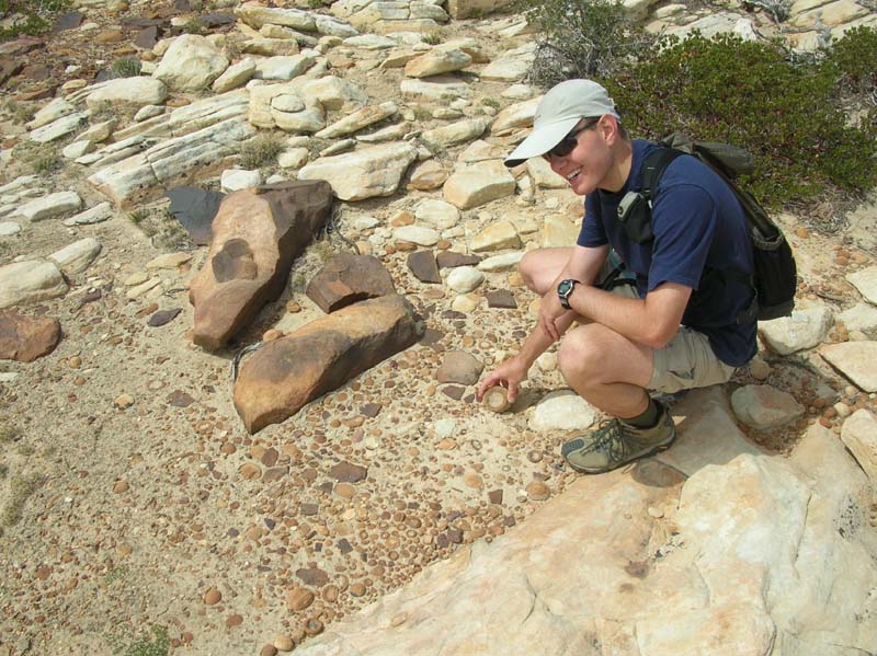 085-Jim_showing_the_weathered_rocks