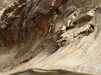 130-Erika_sliding_down_steep_slick_section
