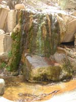 134-water_flowing_over_moss_covered_sandstone