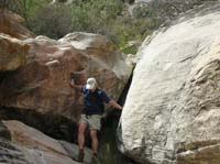 140-Jim_showing_us_how_to_downclimb_a_boulder